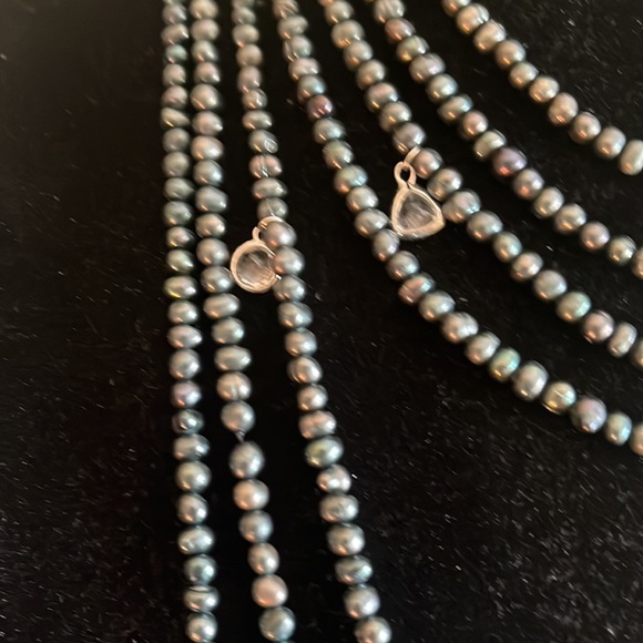 Peacock colored pearls with dangling white topz nuggets